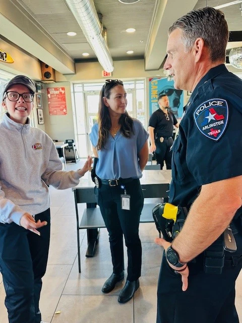 Arlington Police officers connect with community members during a Lemonade with Cops event