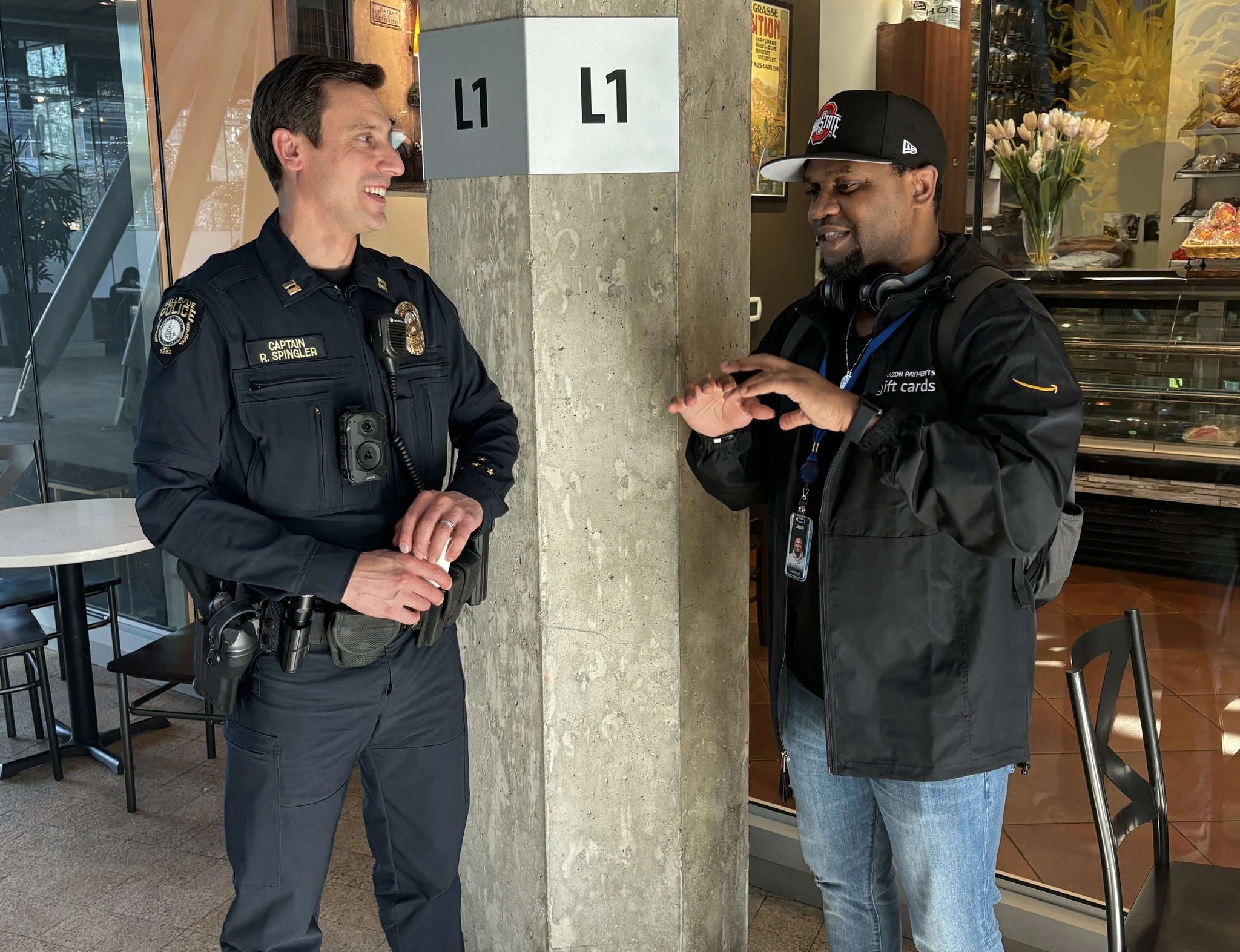 Bellevue Police officer engages with a community member during a Coffee with a Cop event
